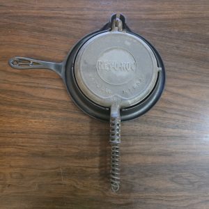 Rev-O-Noc (Griswold) Cast Iron Waffle Iron